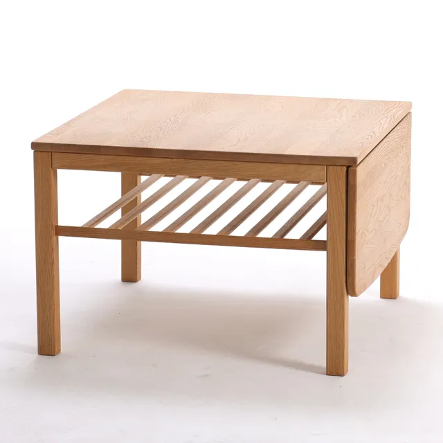 Haslev Møbelfabrik: Coffee table made of solid oak with slatted shelf.