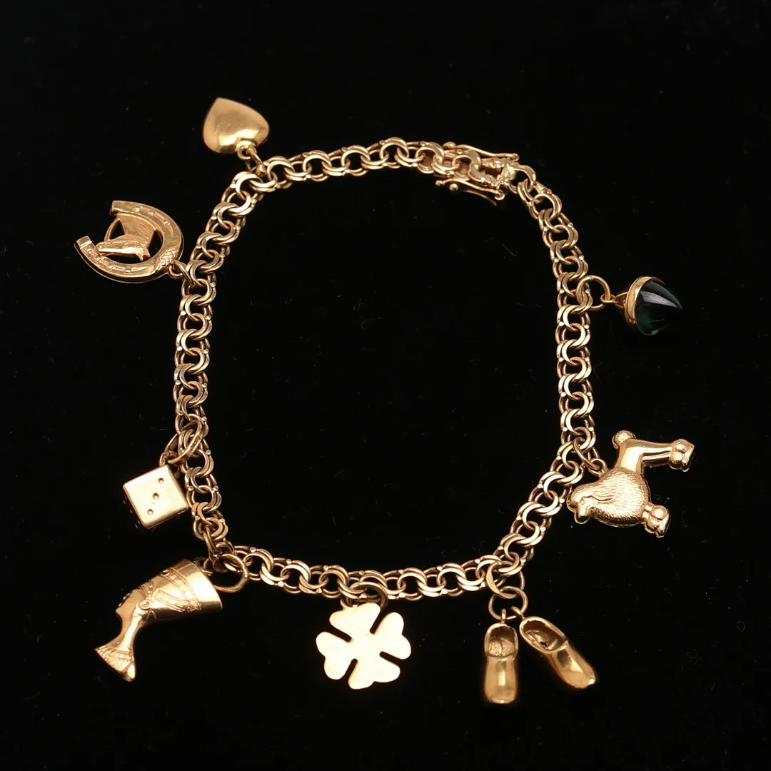 ARMLÄNK, bismarck med BERLOCKER, 18 k guld, 13,7 gram, Michelsson Eftr Ab H Enskede, 1966. — Bracelets — Auktionshuset Thelin & Johansson