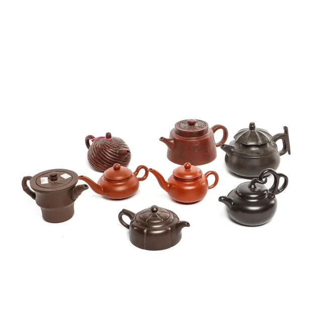 Collection of eight Chinese Yixing teapots, 1900s (8)
