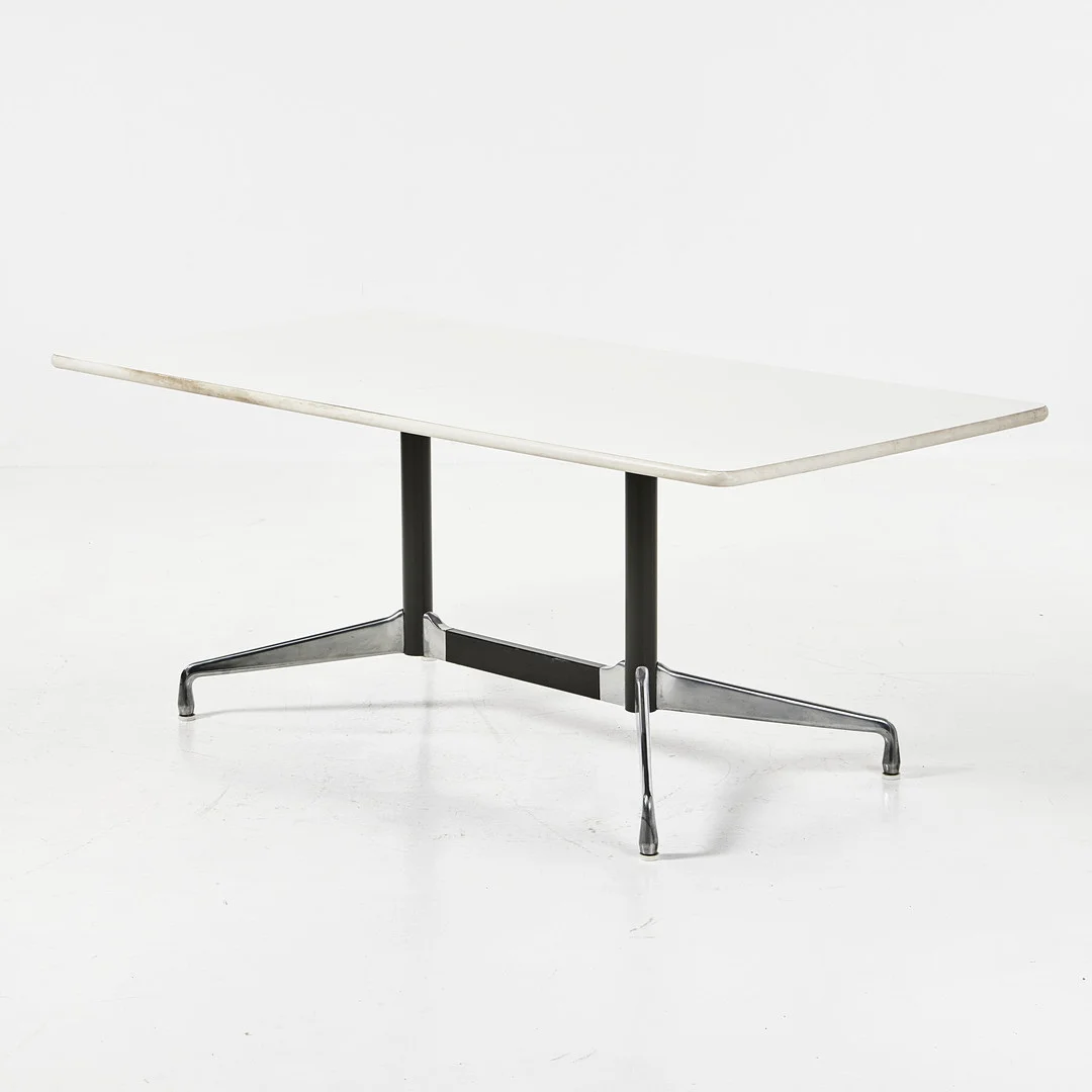 CHARLES & RAY EAMES. "Segmented Table", matbord, benställning i svärtad och kromad stål, bordsskiva i vit laminat. — Tables — Stockholms Auktionsverk Magasin 5