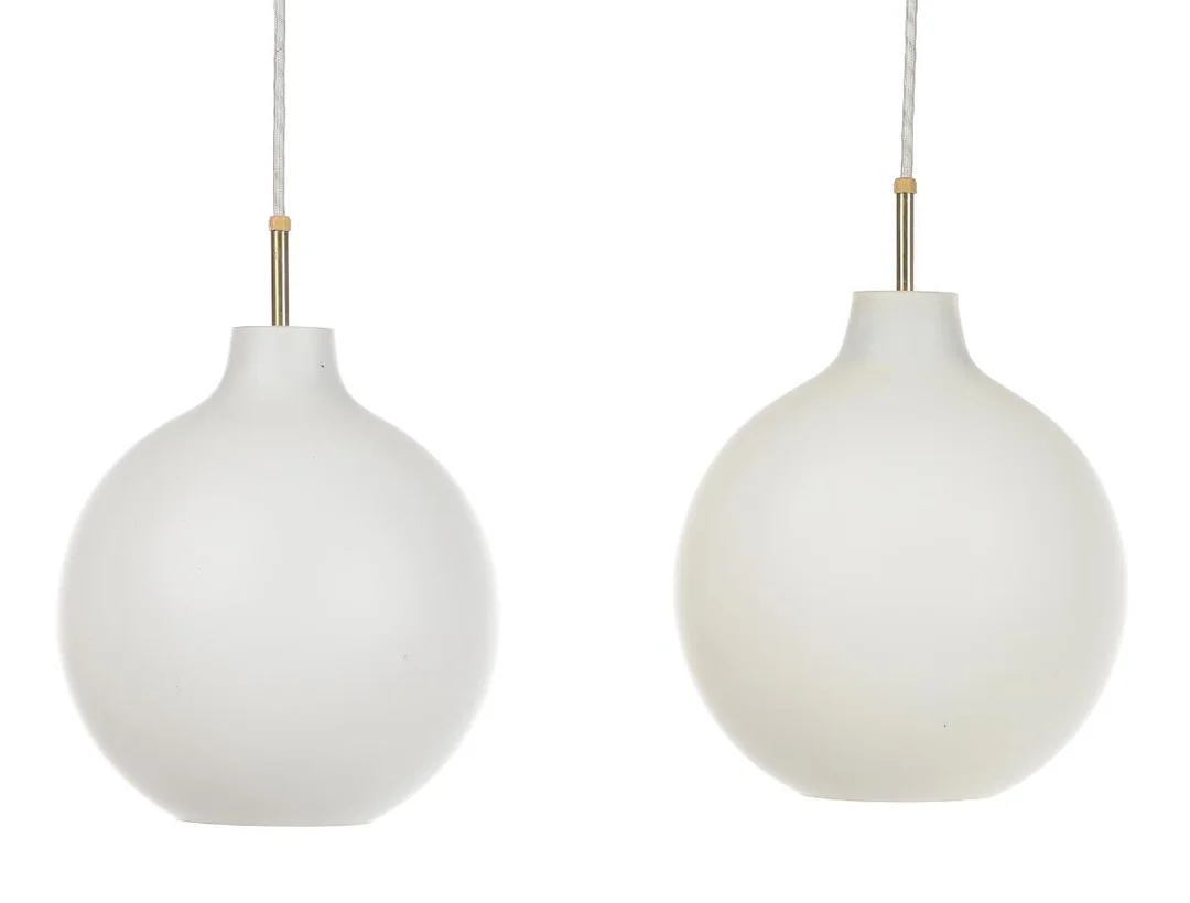 “Satellite”. A pair of frosted two-layer opal glass pendants, metal mounting and porcelain socket. Manufactured by Louis Poulsen. H. excl. mounting 28. Diam. 23 cm. (2) — Modern Lighting — Bruun Rasmussen