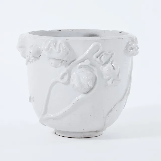 CARL MILLES. Urna, fajans, reliefdekor av blommor.
