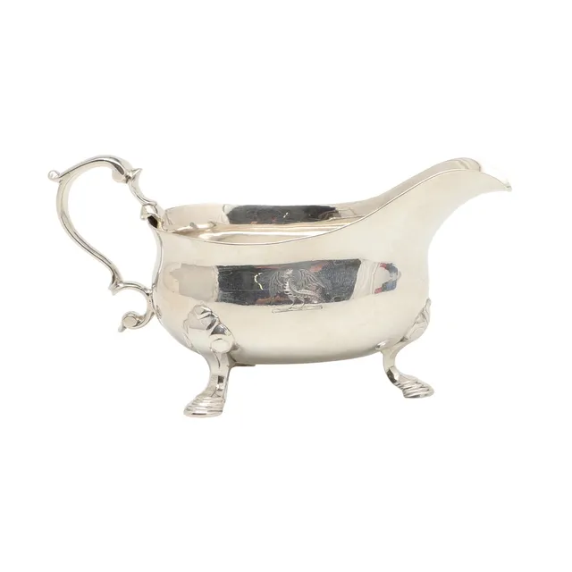 A GEORGE II SMALL SILVER SAUCE BOAT.
