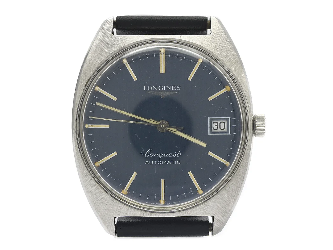 LONGINES, Conquest, Cal L633.1, Serie nr. 52852307, Ref nr. 1578-1-633, Boett nr. 17484925, herrur, 33 mm, stål, automatisk, plexiglas, datum, skadad urtavla, defekt, läderband, ca 1972. — Klockor/Longines — Kaplans