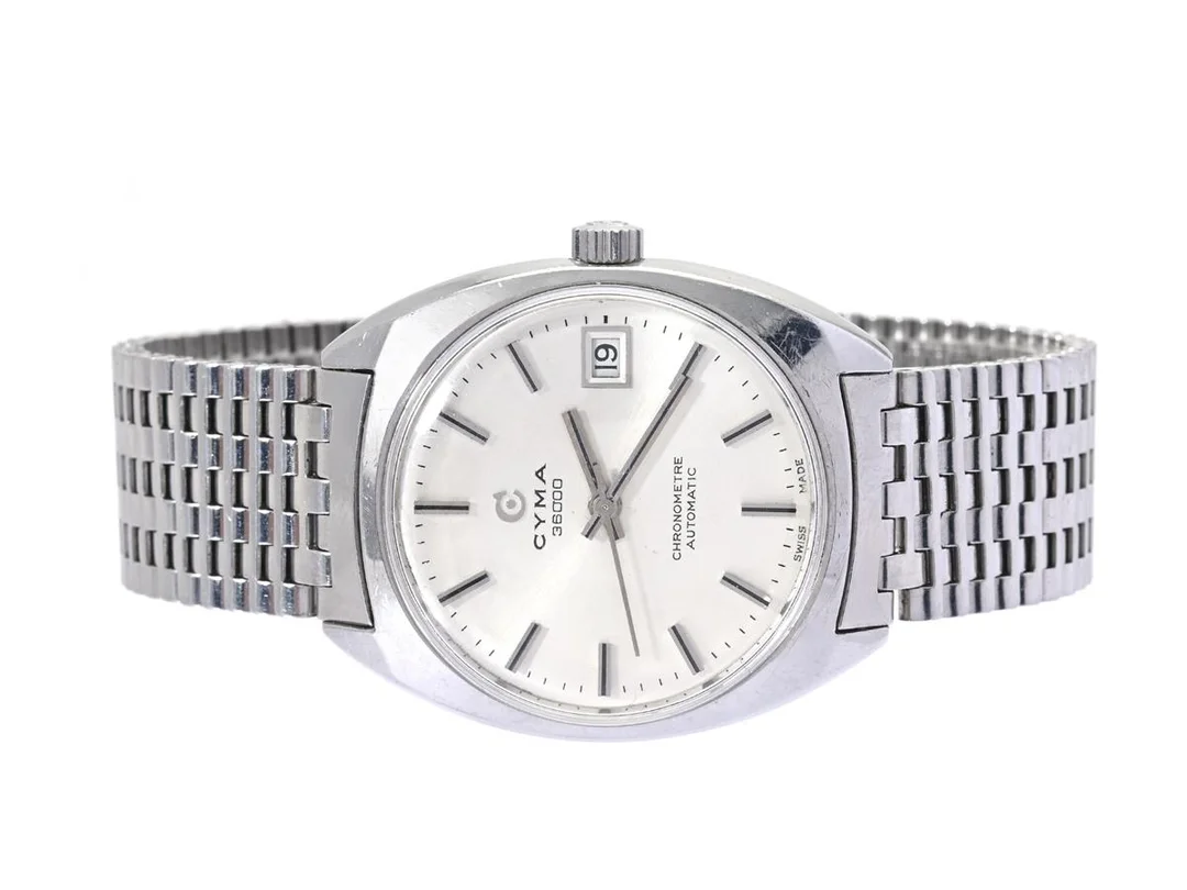 CYMA, Navystar, 36000, Chronometre, Cal R.814.01, Verk nr. 4028, Boett nr. 2814.001 / 559, herrur, 34 mm, stål, automatisk, plexiglas, datum, skadad urtavla, originallänk, Ref nr. NSA, längd 180 mm, ca 1975. — Klockor/Cyma — Kaplans