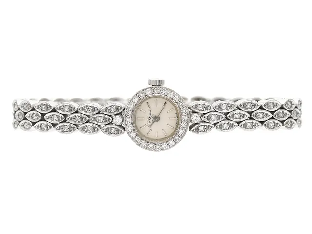 L.U.CHOPARD, Geneve, damur, 15,5 mm, Cal Felsa, Boett nr. 68185, 18K vitguld, manuell, safirglas (skadat), skadad urtavla, diamantkrans (24 st. 8/8), briljanter på boetten (2 st. ca W/VS, ca 0,06 ctv), integrerad originallänk med diamanter (86 st. 8/8), längd 183 mm, totalvikt 41,4 gram, ca 1965, box.