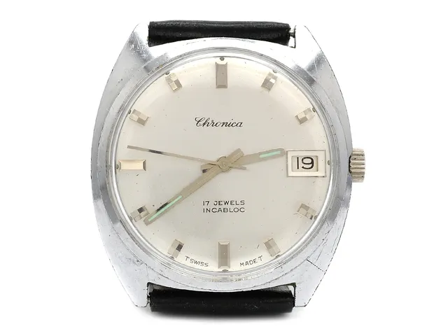CHRONICA, herrur, 34 mm, Boett nr. 7017, vitmetall, manuell, plexiglas, datum, skadad urtavla, skadad boett, läderband, ca 1970.
