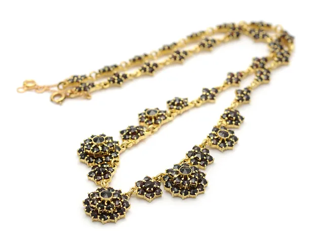 COLLIER, förgylld metall, granater, längd 42 cm, säkerhetskedja.