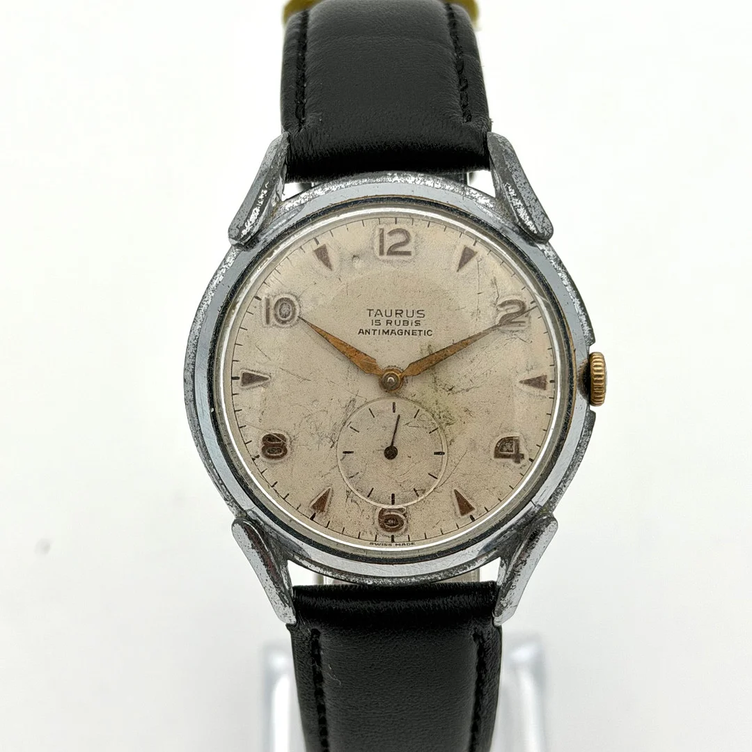 TAURUS, armbandsur, 1940/50-tal, manuell, stål. — Wristwatches — Skandia Auktion