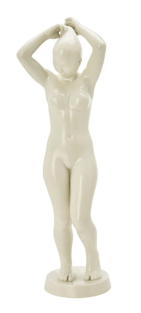 Blanc de chine figure in the form of a posing woman. Unsigned. Manufactured by Bing & Grøndahl, 2282. H. 52 cm.