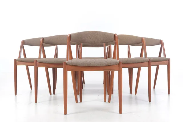 Kai Kristiansen for Schou Andersen Furniture Factory. Seven teak chairs, model '31' (6)