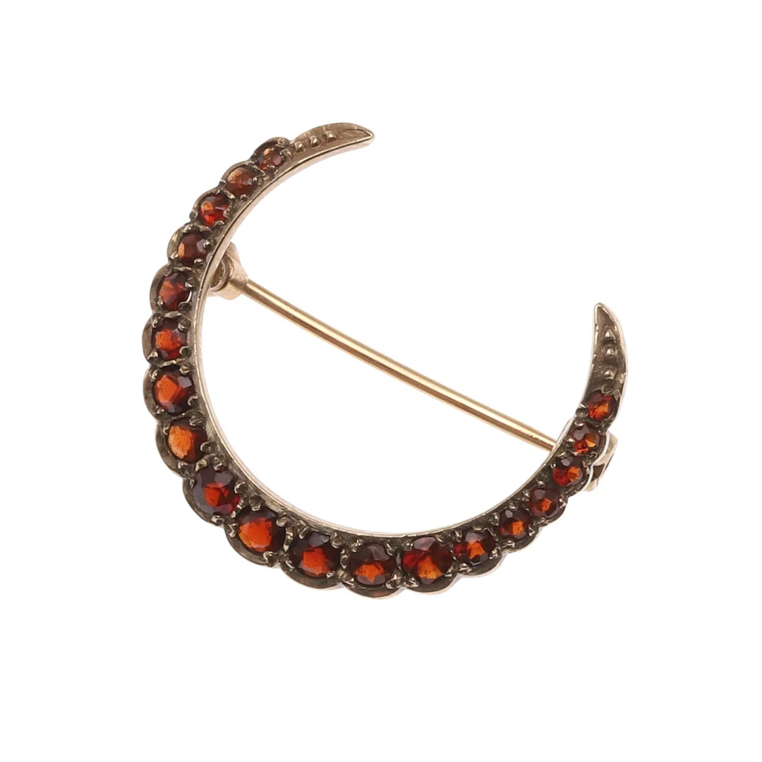 A GARNET AND 9CT GOLD CRESCENT BROOCH. — Brooches & Pendants — Lawrences Auctioneers