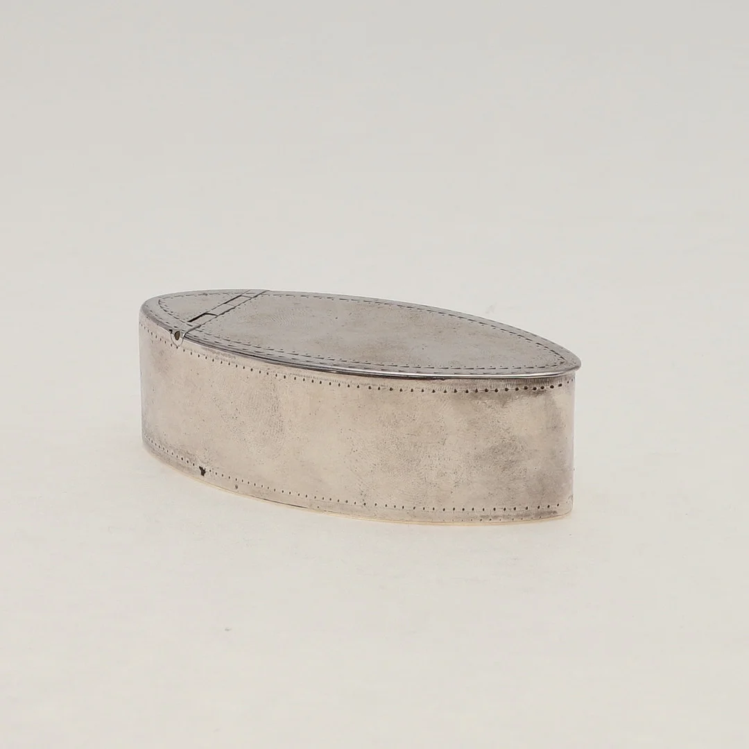 A GEORGE III NAVETTE-SHAPED SNUFF BOX. — Silver — Lawrences Auctioneers