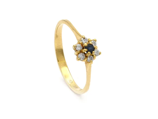 CARMOSÉRING, 18K guld, safir ca 0,05 ct, 6 briljanter ca 0,12 ctv, ca TCr-Cr/VS, stl 16,5 mm, vikt 1,5 g.
