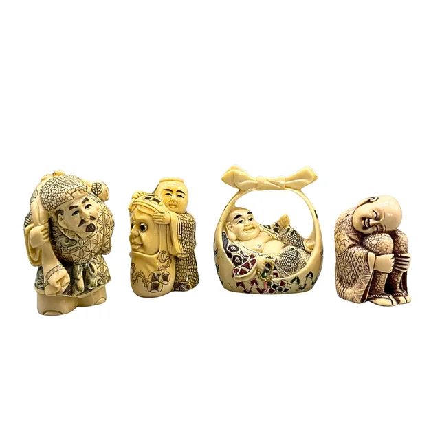 VIER ASIATISCHE BUDDHA FIGUREN.