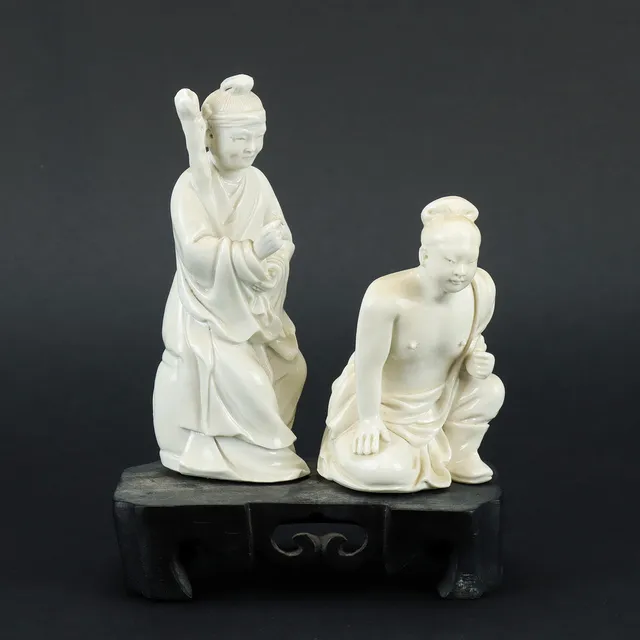 A figure group of two Chinese 'blanc de chine' bisquit porcelain figurines 19th/20th century.