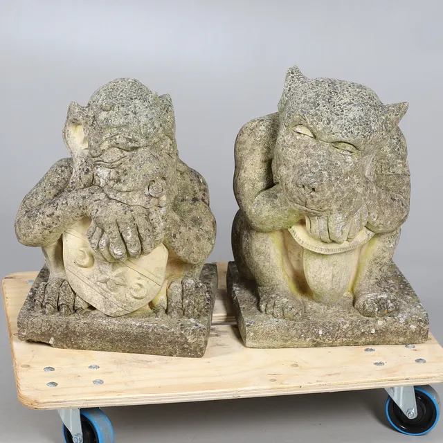 TWO RECONSTITUTED STONE 'GARGOYLE' STATUES/GATEPOST FINIALS.