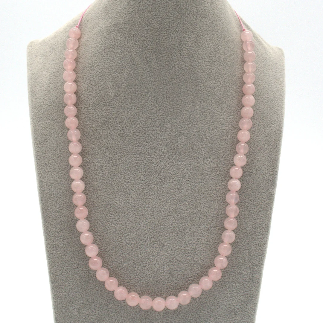 PERLENCOLLIER AUS ROSENQUARZ, , POLIERTE PERLEN, VERSTELLBARER KORDELVERSCHLUSS., 20. JAHRHUNDERT, CA. 55 CM. — Necklace — Kunst- und Auktionshaus Kleinhenz