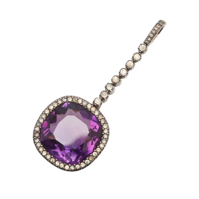 AN AMETHYST AND PASTE PENDANT.