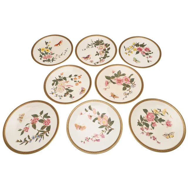 A SET OF EIGHT LATE VICTORIAN/EARLY 20THC ROYAL WORCESTER DESSERT PLATES.