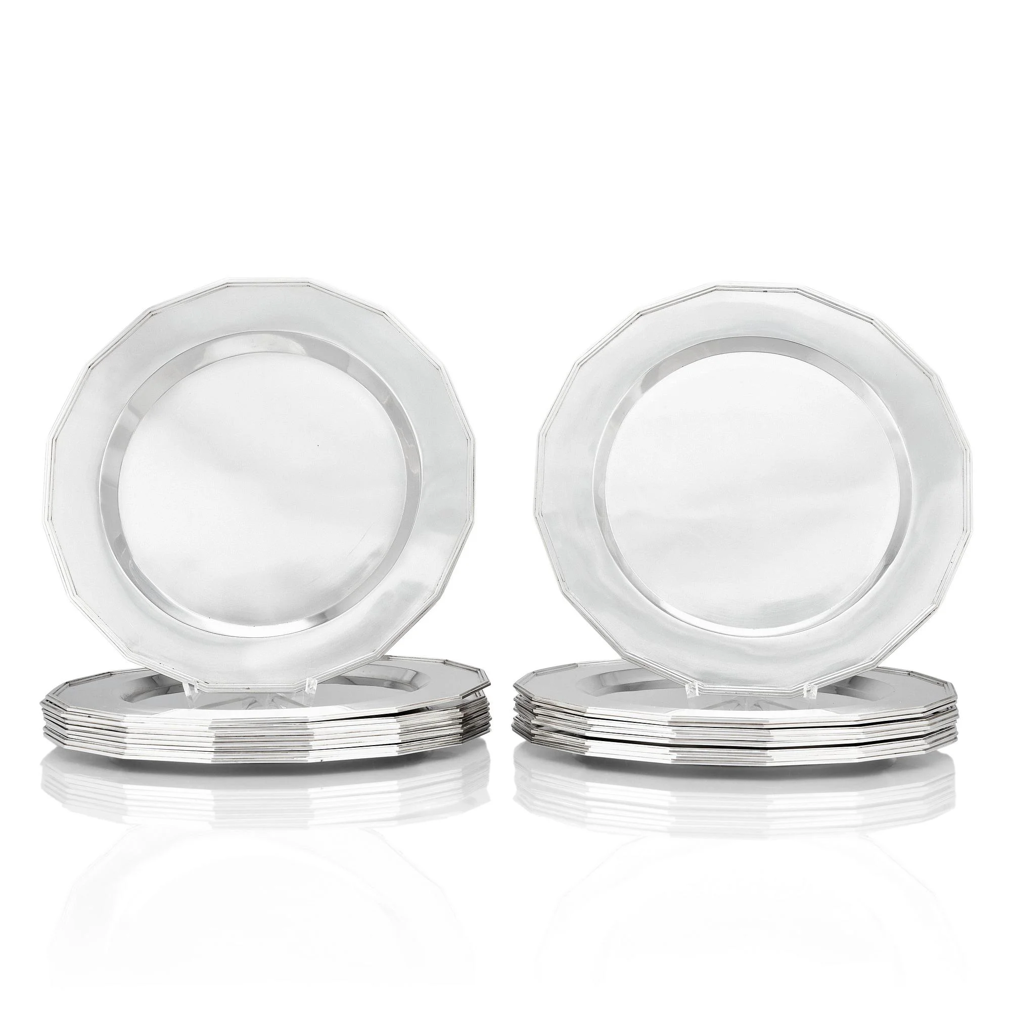 Wiwen Nilsson, kuverttallrikar, 18 stycken, Lund 1956 - 1962, sterling silver. — Bukowskis