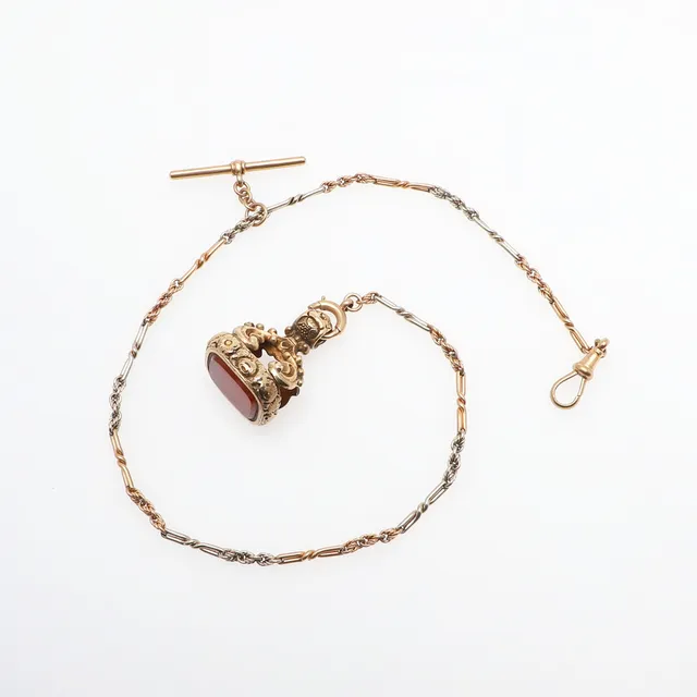 A 9CT GOLD WATCH CHAIN.