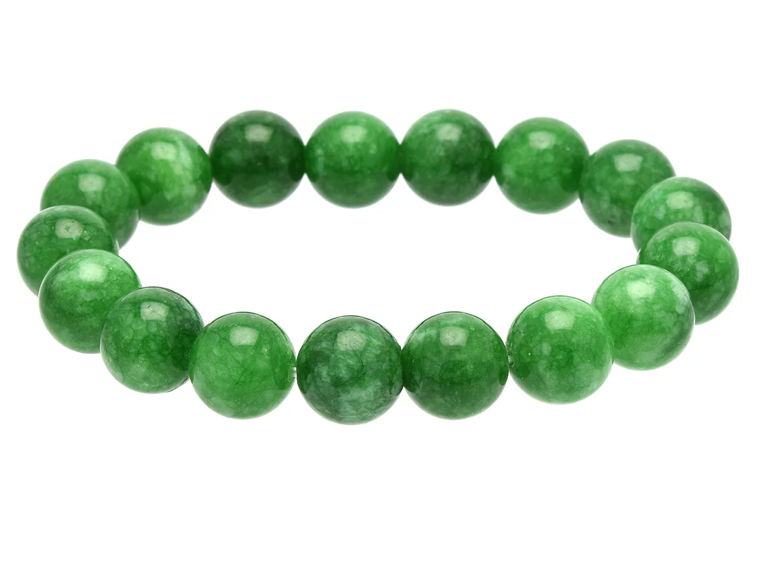 ARMBAND, färgade gröna kvartskulor, elastiskt, vikt 42,5 g. — Smycken/Armband — Kaplans