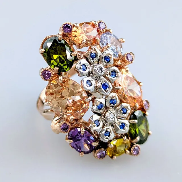 - Retrò Ring, Roségold und Silber.
