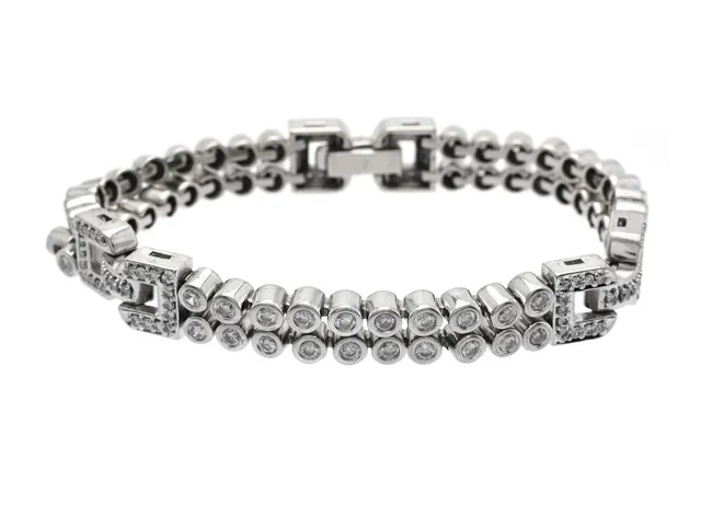 ARMBAND, 14K vitguld, 141 briljantslipade diamanter ca 3,81 ctv, ca W-TCa/P, längd 19 cm, vikt 39,7 g, enstaka diamanter med skador och nagg.