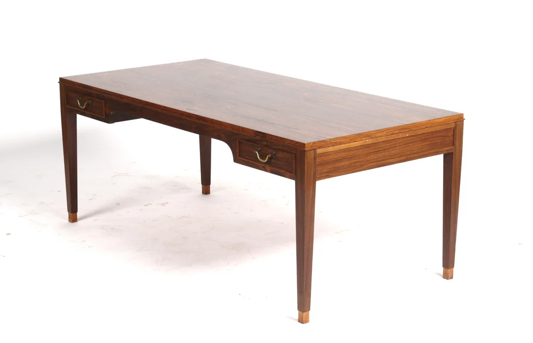 Fritz Henningsen. Rosewood coffee table with four drawers, circa 1960. — Furniture/Coffee tables, occasional tables — Lauritz