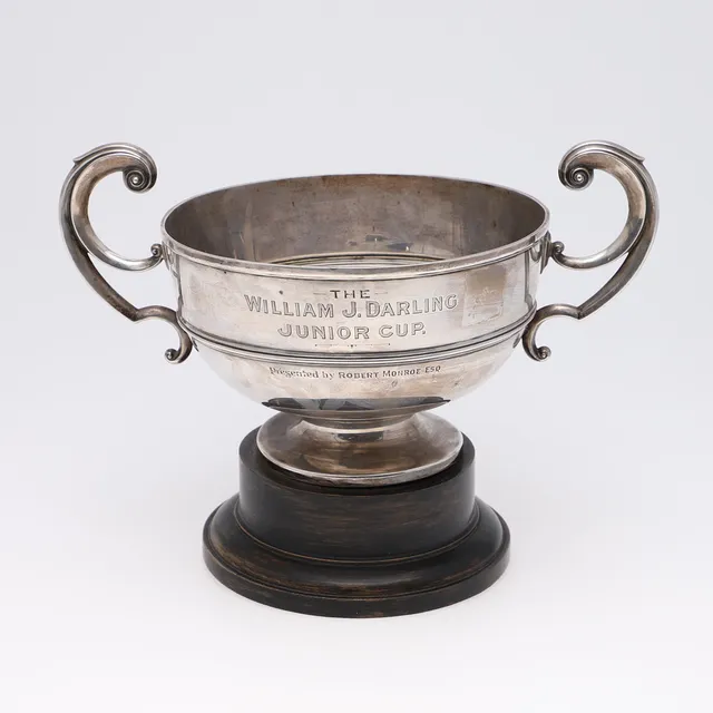 A GEORGE V TWO-HANDLED TROPHY.