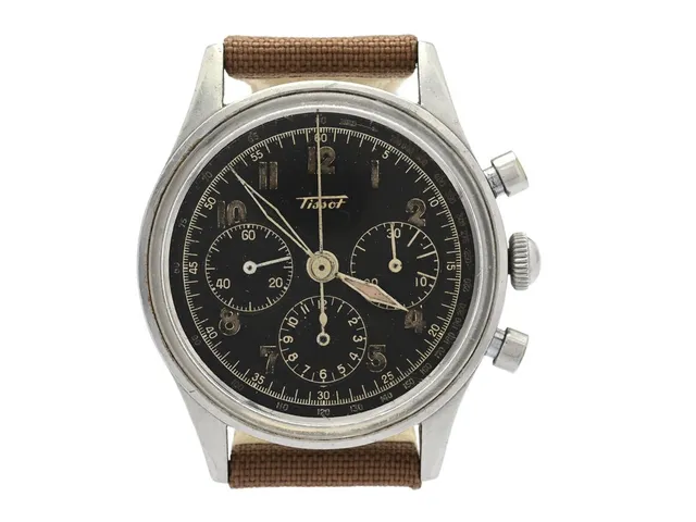 TISSOT, kronograf (se fördjupad info), herrur, 35 mm, Cal C27-41H (Lemania), Verk nr. 209018, Serie nr. 1692905, Boett nr. 6216-5, stål, manuell, plexiglas (skadat), skadad urtavla/visare, gravyr, läderband, ca 1946.