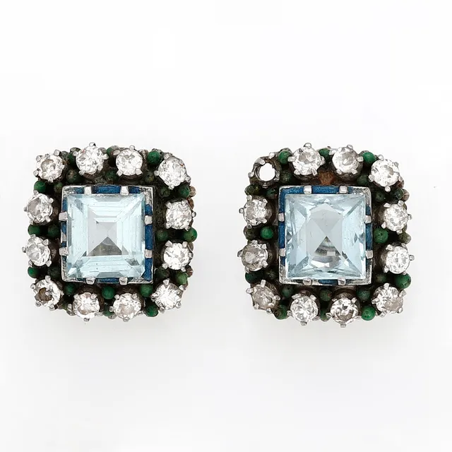 JAUME MERCADÉ. Rosette earrings with aquamarines and diamonds, circa 1930.