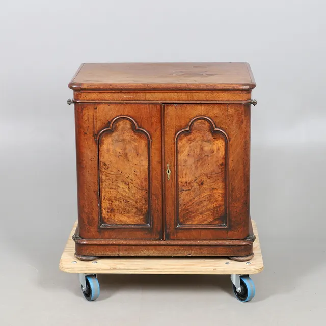 A MAHOGANY GOTHIC CUPBOARD.