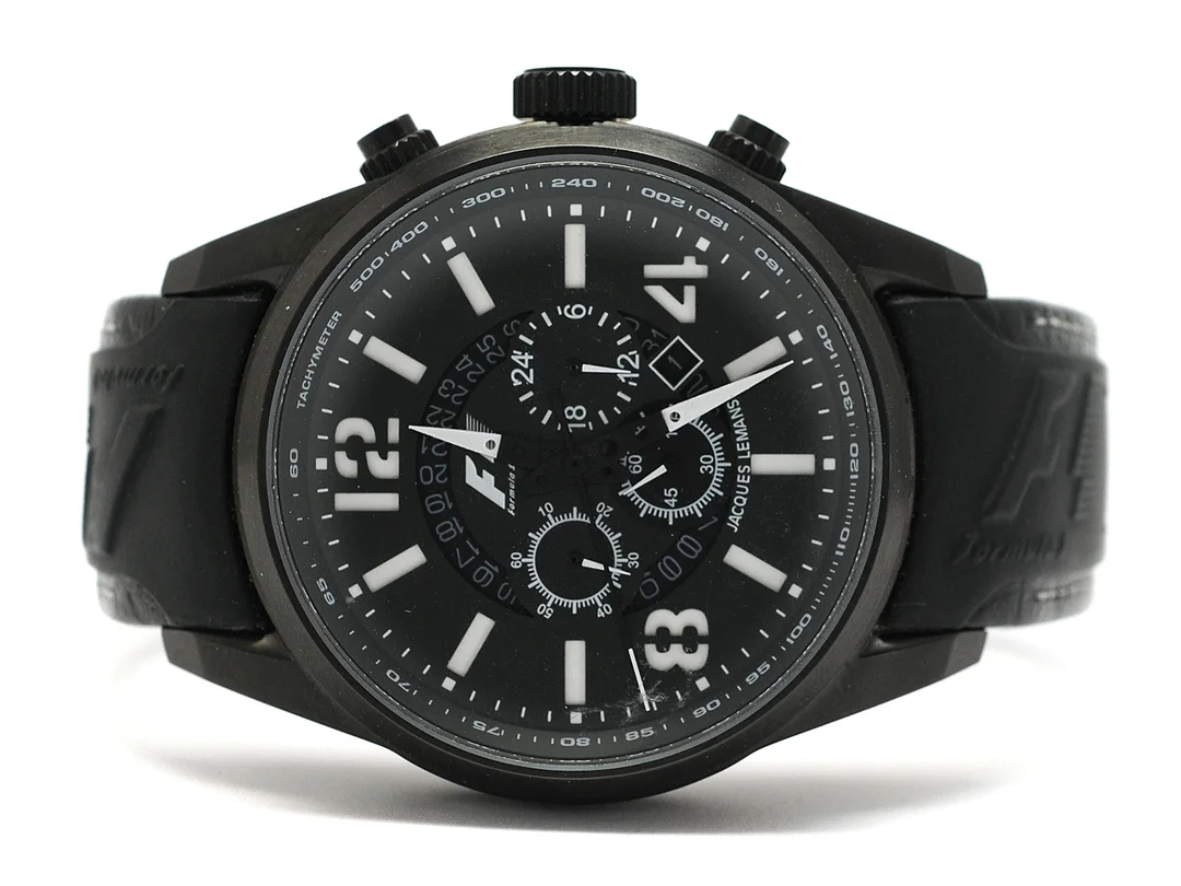 JACQUES LEMANS, Formula 1, "Tachymeter", "Limited Edition", nr. 267/500, kronograf, herrur, 48,5 mm, Ref nr. F5043, svarteloxerat stål, quartz, mineralglas, datum, 24-timmarsvisning, läderband, originalspänne, cert (ej ifyllt), ca 2005, box, ytterkartong. — Klockor/Jacques Lemans — Kaplans