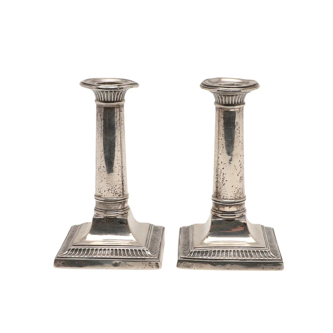 A GEORGE V PAIR OF SILVER CANDLESTICKS. — Silver — Lawrences Auctioneers