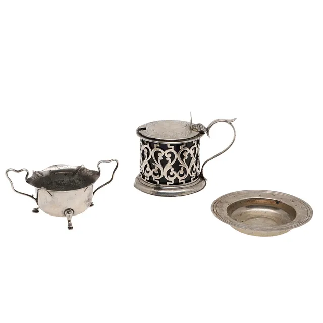 A SILVER MUSTARD POT, AN ARMADA PIN DISH, AND A SALT.