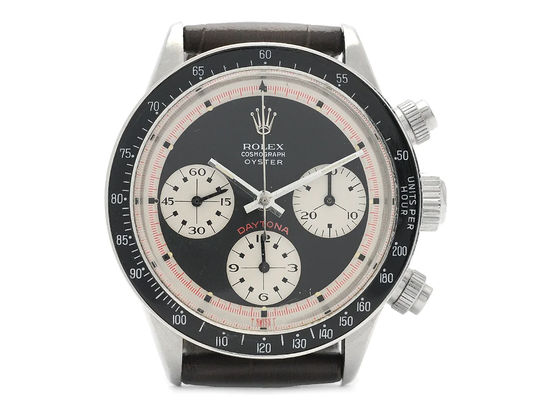ROLEX, Cosmograph Oyster, Daytona, s.k. "Paul Newman", "Units per hour 200", Ref nr. 6263, Serie nr. 2085498, Cal Valjoux 727, Boett nr. 6239 (C.R.S), kronograf, herrur, 37 mm, stål, manuell, plexiglas, skadad urtavla (9/10), defekt krona, läderband, ca 1969. — Klockor/Rolex — Kaplans