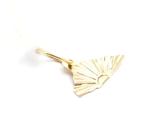 Parti guld 18K 0,3g skadad