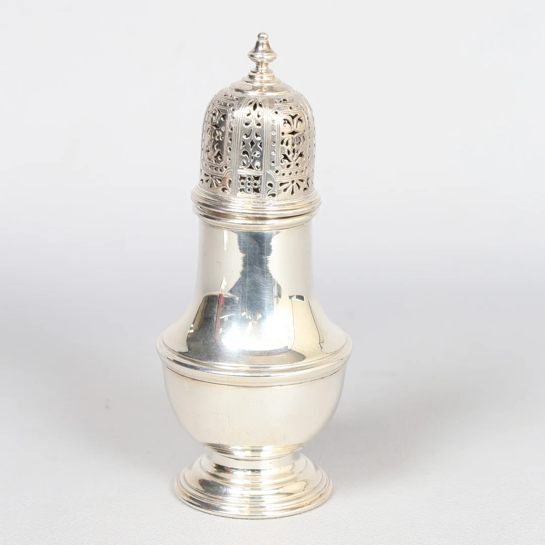 AN ELIZABETH II SILVER CASTOR. — Silver — Bishop & Miller