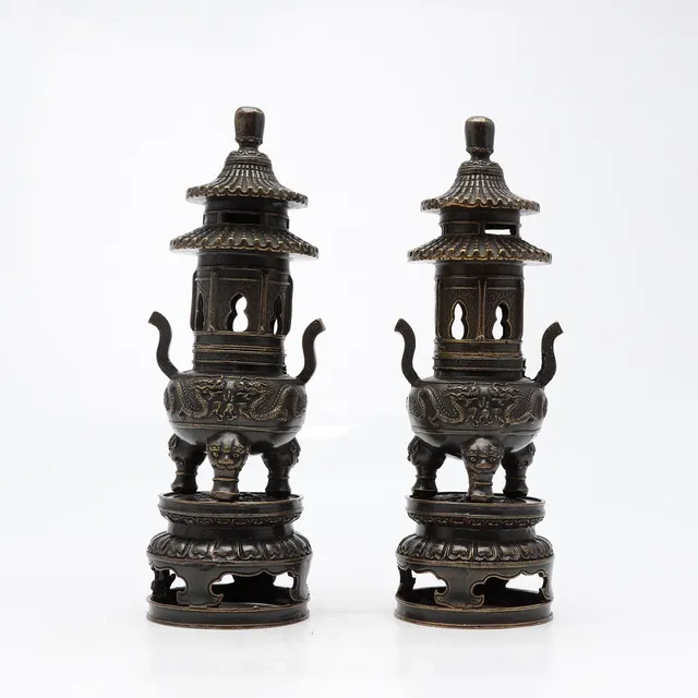 Pair of Chinese pagoda-shaped censers, in patinated bronze, 20th Century.