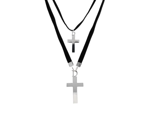 COLLIER, CHRISTIAN DIOR, två st collier, svart sammetband, silverfärgad metall, kors, märkt Dior, längd på band med större kors 50 cm, den mindre justerbar längd 38-42 cm, längd på kors 5 cm, samt 3 cm, ask.