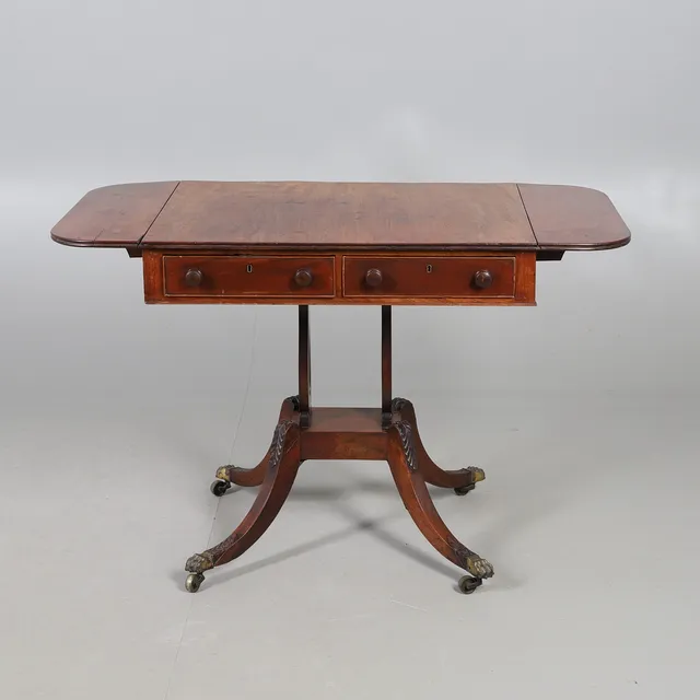 AN EARLY 19TH CENTURY MAHOGANY SOFA TABLE.