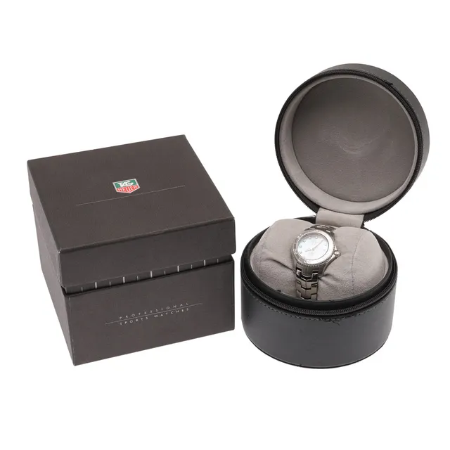 A LADY'S STAINLESS STEEL AND DIAMOND LINK WRISTWATCH BY TAG HEUER.