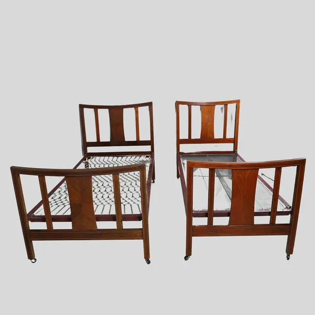 A PAIR OF EDWARDIAN INLAID MAHOGANY 3FT BEDSTEADS.