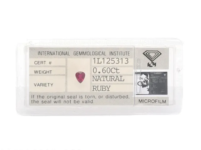 RUBIN, droppslipad 0,60 ct, IGI certifikat 1L125313.