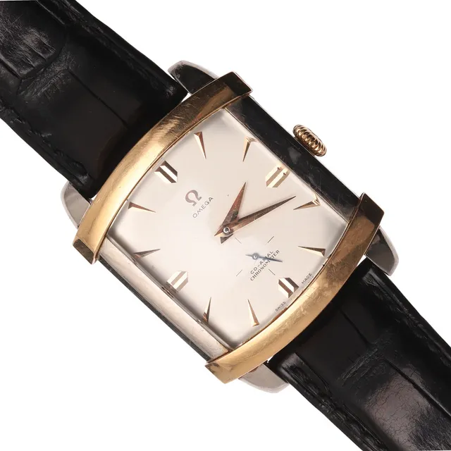A GENTLEMAN'S STAINLESS STEEL AND GOLD CO-AXIAL CHRONOMETER WRISTWATCH BY OMEGA.