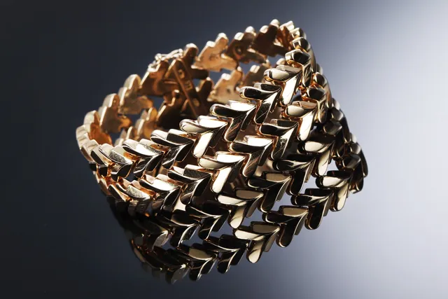 DonnaGemma, Vicenza. Bred retroarmlænke af 18 kt. guld, ca. 1960'erne
