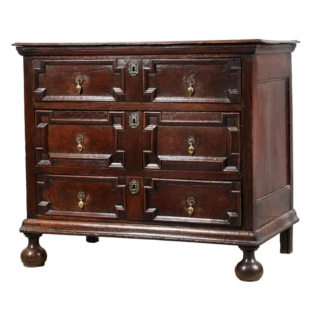 A CHARLES II OAK GEOMETRIC CHEST OF DRAWERS, CIRCA 1680.