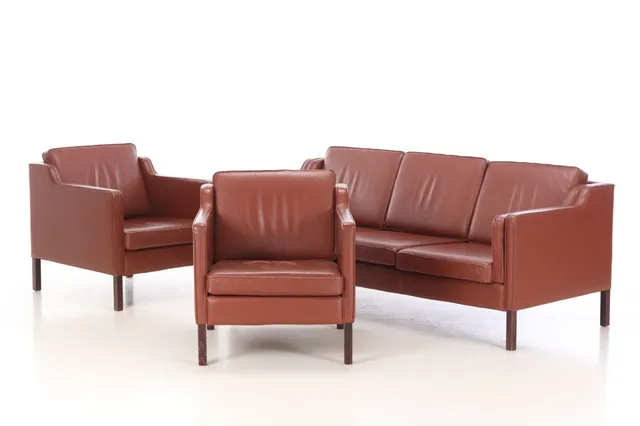 Stouby. Three-person as well as a pair of armchairs, leather, model 'Eva' (3)